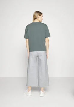 Calvin Klein Performance WIDE LEG CROPPED PANTS - Jogginghose - Athletic Grey Heather -Angebote Stil Tage Store 6fe4918652a8494e8285e49d7848842d